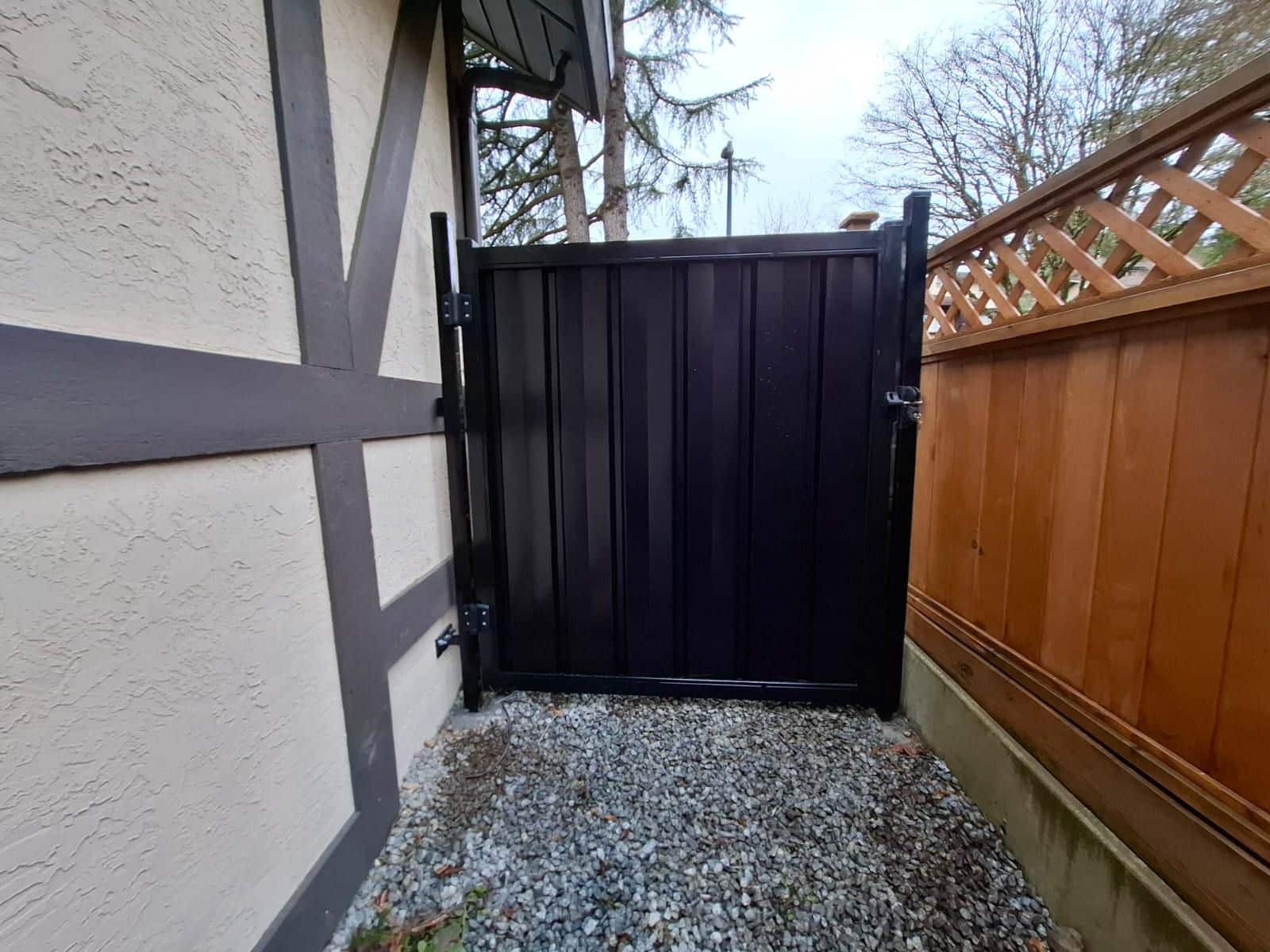 solid-metal-fence-door