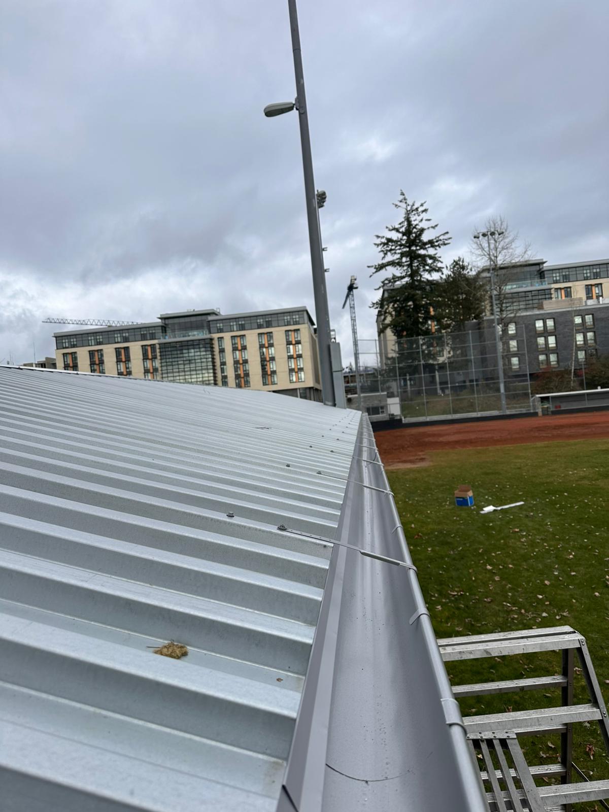 Gutters on an outdoor shelter at SFU in Burnaby, BC installed by Raybern Erectors - 1